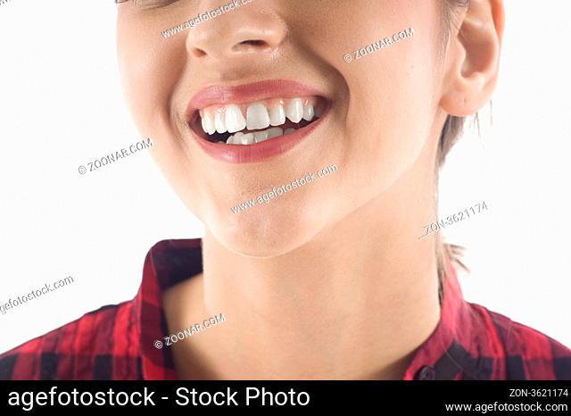 Closeup of Young Smiling Woman Teeth- Isolated over White Background
