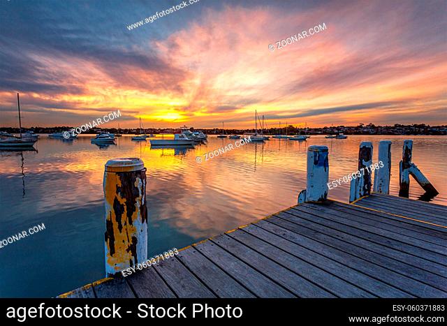 Yachts and boats moored on the tranquil waters of Lilyfield at sunset