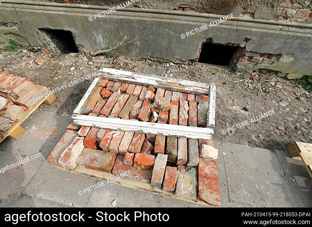 15 April 2021, Mecklenburg-Western Pomerania, Tribsees: Bricks and other parts of a demolished house are stacked on pallets