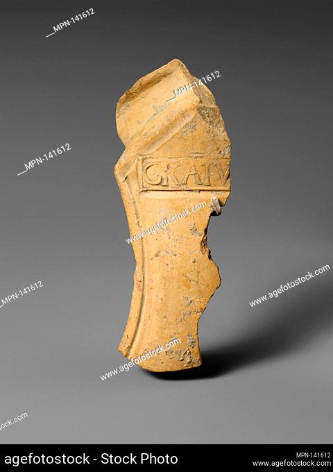 Terracotta mortarium fragment. Period: Early Imperial; Date: A.D. 50-85; Culture: Roman; Medium: Terracotta; Dimensions: Overall: 5 x 2 7/8 x 1 1/4 in