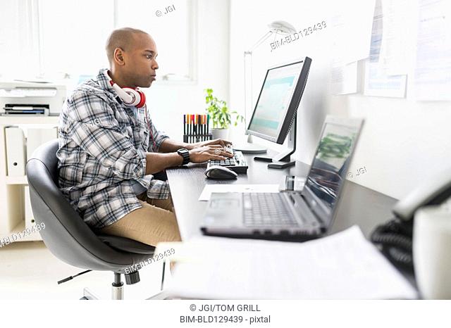 Black businessman working in office