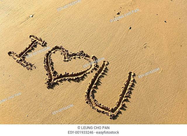 I love you drawing on the beach