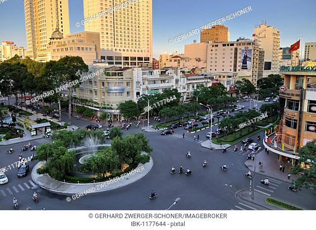 Famous roundabout Nguyen Hue in front of the Hotel Caravelle and Rex Hotel, Ho Chi Minh City, Saigon, Vietnam, Southeast Asia