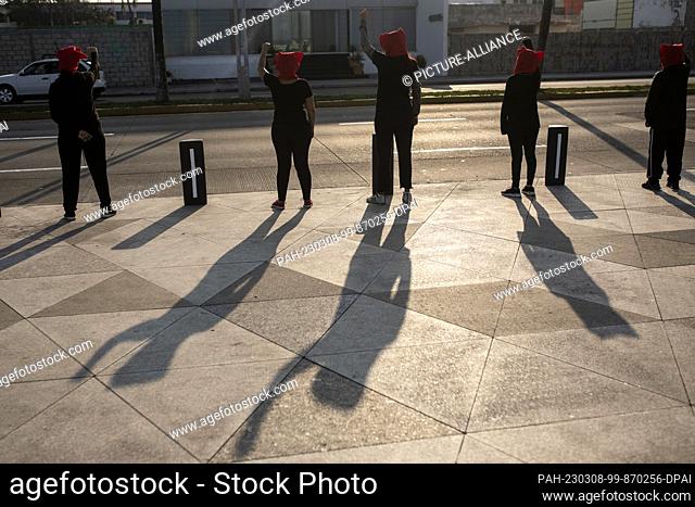 07 March 2023, Mexico, Veracruz: The women of the collective ""Rabia"" protest with an artistic performance against the 11 murders of women registered daily in...