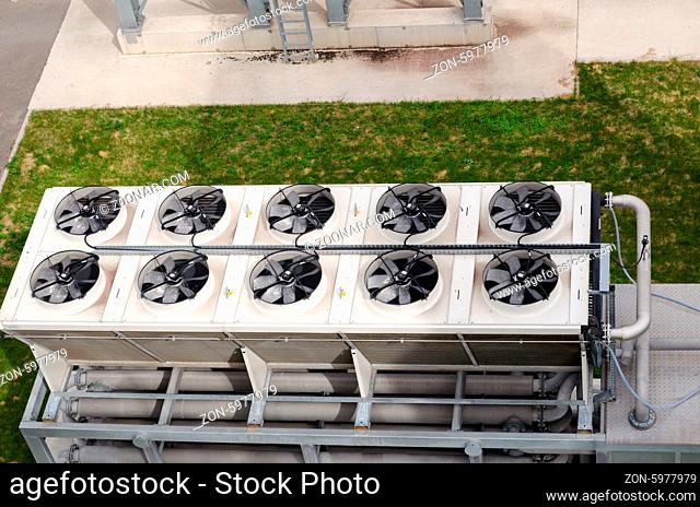 Ventilator fan spin on industrial building of biogas bio gas plant. Alternative energy process from water treatment facility sludge