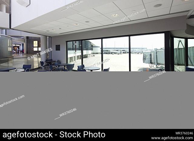 Cafe with a view to the airport apron, and arrivals and departures gates