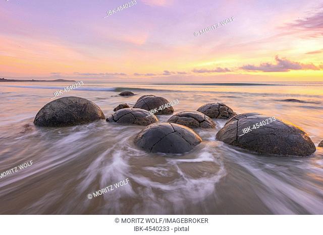Moeraki boulders, at sunrise, geological formation, Koekohe Beach, Moeraki, East Coast, Otago, South Island, New Zealand