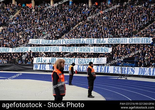 16 December 2023, Berlin: Soccer: Bundesliga 2, Hertha BSC - VfL Osnabrück, matchday 17, Olympiastadion. Hertha fans hold banners with the slogan ""We want...