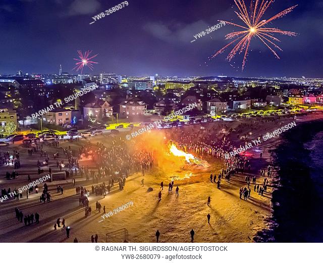New Year's Eve Celebration. Bonfires and fireworks on New Year's is an annual event, Reykjavik, Iceland. This image is shot with a drone