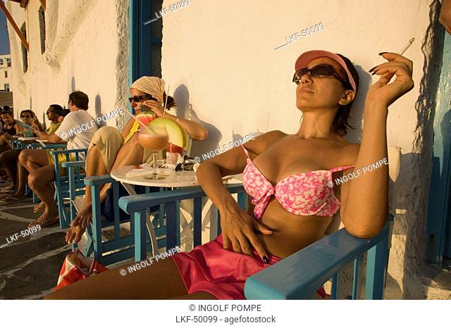 Women sitting in front of the Caprice Bar, Little Venice, Mykonos-Town, Mykonos, Greece