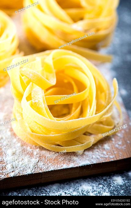 Freshly made italian tagliatelle pasta, home cooking