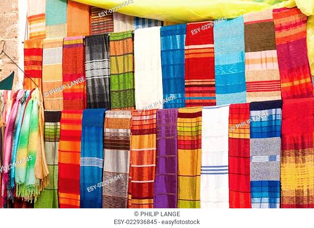 Colorful oriental fabrics for sale in the medina of Essaouira, Morocco, Africa