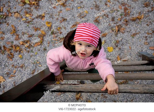 little girl climbing up ladder - 01/11/2008