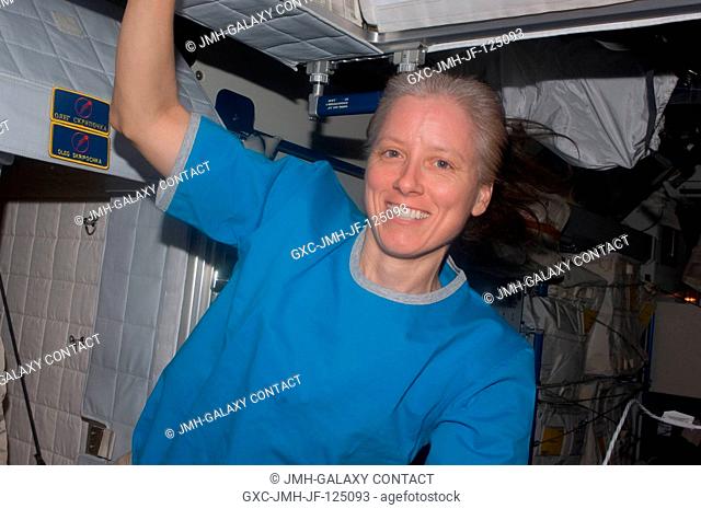 NASA astronaut Shannon Walker, Expedition 25 flight engineer, is pictured in the Harmony node of the International Space Station