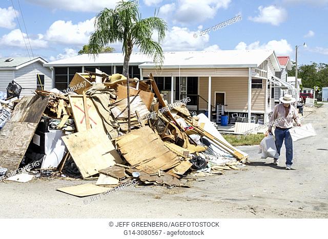 Florida, Everglades City, after Hurricane Irma, houses homes residences, storm disaster recovery cleanup, flood surge damage destruction aftermath, trash