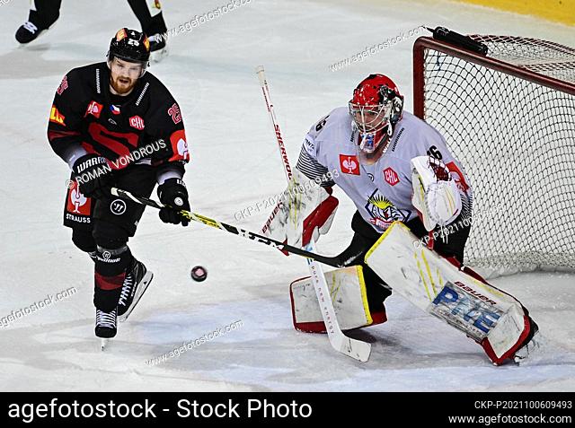 David Kase of Sparta, left, and Maximilian Franzreb, goalkeeper of Bremerhaven in action during the Champions Hockey League Group A match HC Sparta Praha vs...