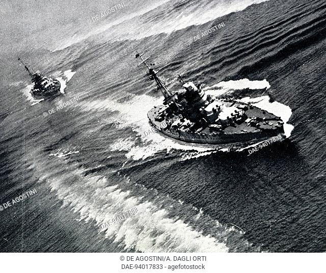 The battleships Cavour and Giulio Cesare navigating in open waters, photograph from Illustrazione Italiana, July 14, 1940, Italy, 20th century