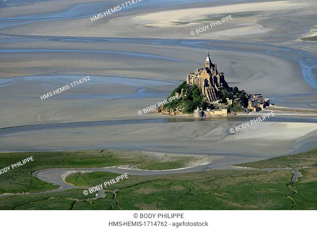 France, Manche, bay of Mont-Saint-Michel listed as World Heritage by UNESCO, aerial view of Mont-Saint-Michel and the polders
