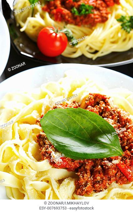 Spaghetti bolognese with basil