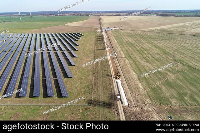 16 March 2020, Brandenburg, Werneuchen: On the open space on the right side of the picture the solar park ""Weesow-Willmersdorf"" is to be built (aerial photo...