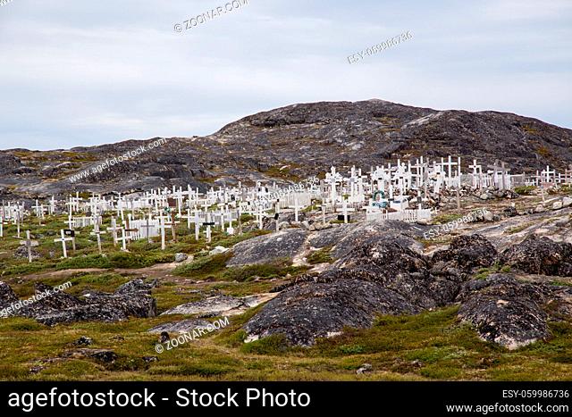 Ilulissat, Greenland - July 11, 2018: The local cemetery with white wooden crosses