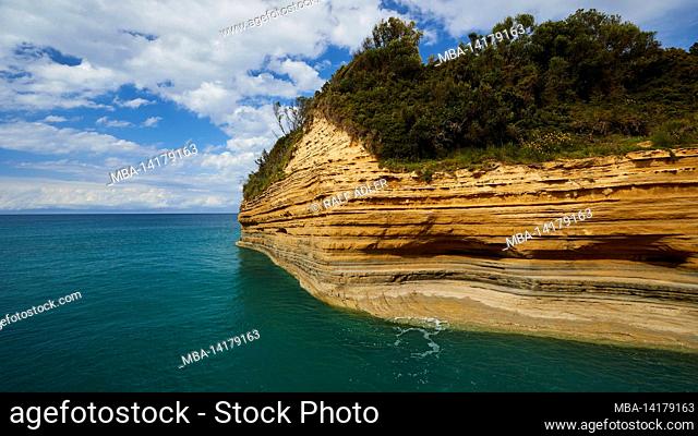 Greece, Greek Islands, Ionian Islands, Corfu, north coast, bizarre rock formations on the coast, Canal d'amour, blue sky, white clouds, sea turquoise