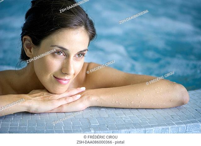 Woman relaxing in jacuzzi