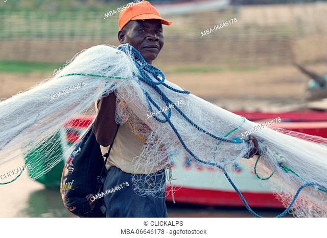 Africa, Malawi, Lilongwe district, Malawi lake. Fisherman with net fishing