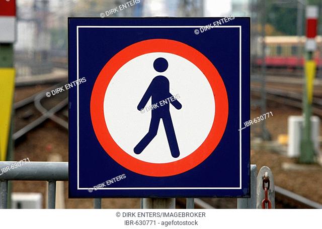 No trespassing sign in font of railway tracks, Germany, Europe