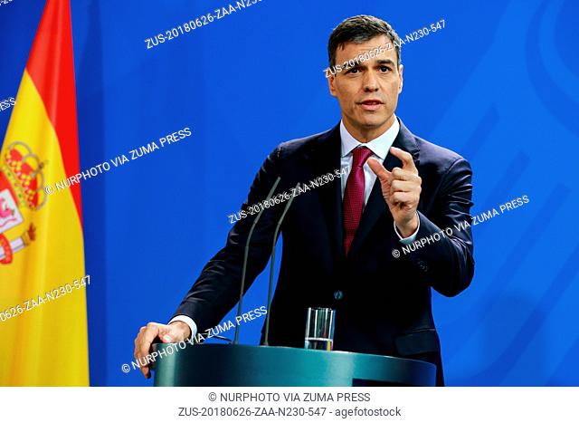 June 26, 2018 - Berlin, Berlin, Germany - Spanish Prime Minister Pedro Sanchez reacts while speaking to the media with and German Chancellor Angela Merke...