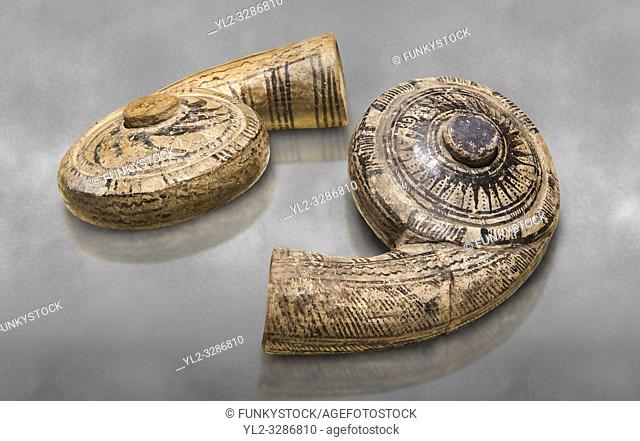 Two decorated terra cotta seashell shaped vessels found in the house of Assyrian trader, Elamma, at the second level of the Karum of Kultepe