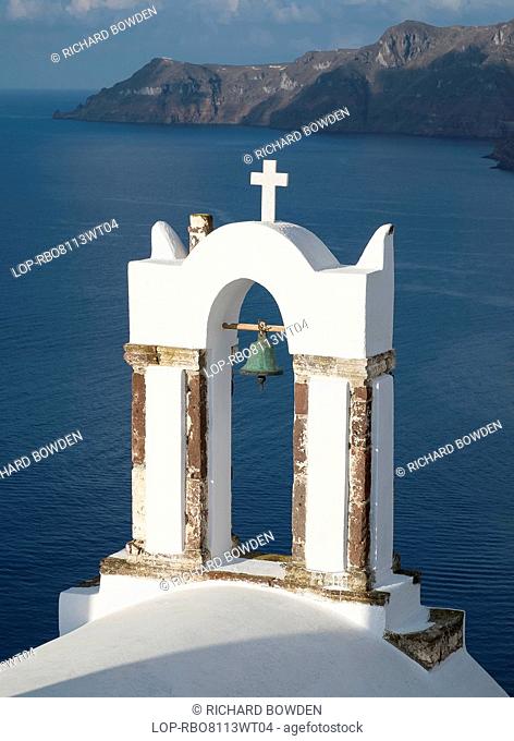 Greece, Santorini, Oia. A church bell tower over looking the caldera in Santorini