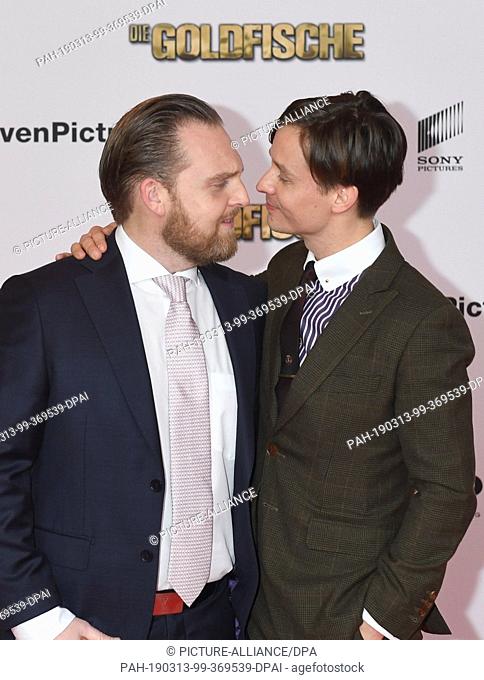 13 March 2019, Bavaria, München: The actors Tom Schilling (r) and Axel Stein come to the world premiere of the comedy ""Die Goldfische"" at the Mathäser Kino