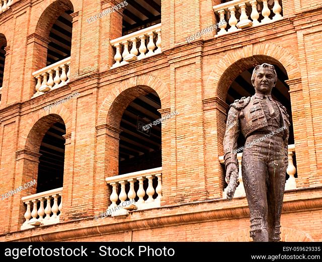 statue of a bullfighter in front of the bullfight arena in Valencia, Spain