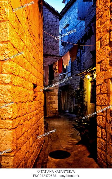 Narrow streets of the mediterranean Trogir at night city. Croatia