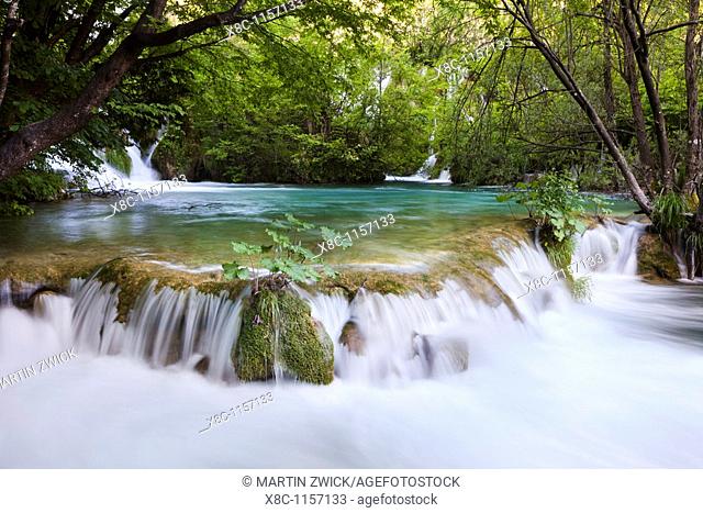 The Plitvice Lakes in the National Park Plitvicka Jezera in Croatia  The lower lakes, the waterfalls of the V  Cascade  The Plitvice Lakes are a string of lakes...