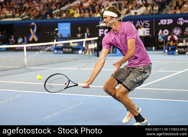 11 January 2023, Australia, Melbourne: Alexander Zverev of Germany in action during the tennis charity event ""Tennis plays for peace"" before the start of the...