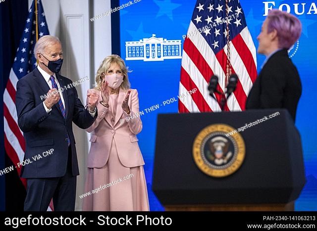 US President Joe Biden and First Lady Dr. Jill Biden listen to remarks by Megan Rapinoe, of the U.S. Soccer Women’s National Team