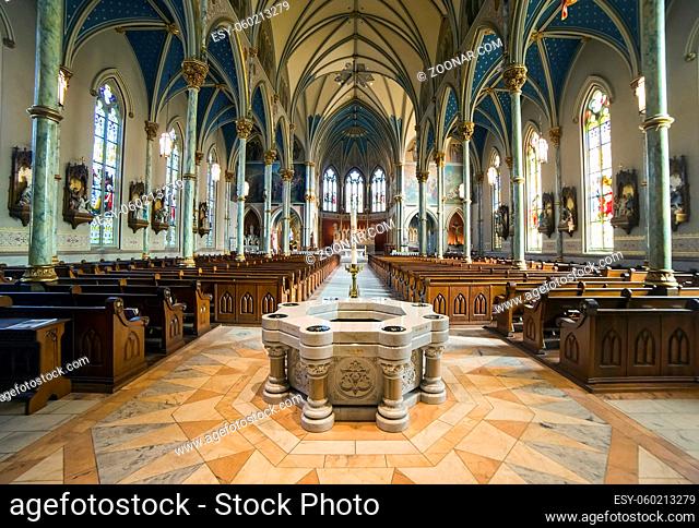 Interior wide angle shot of St. John the Baptist cathedral in Savannah, Georgia