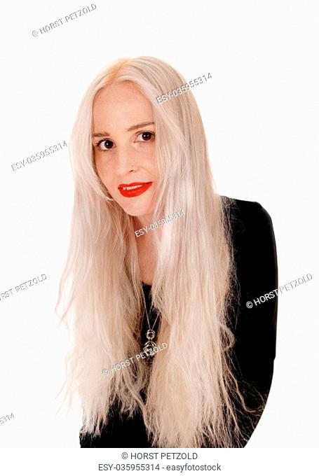 A closeup image of a gorgeous young blond woman with her long .blond hair and big eyes, isolated for white background