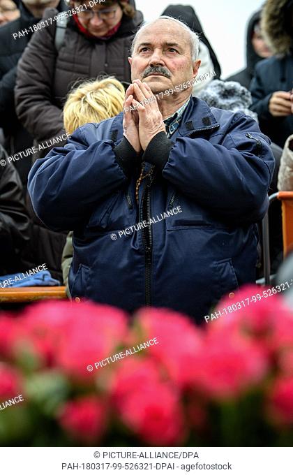 17 March 2018, Germany, Unterflossing: Self-appointed seer, Salvatore Caputa, from Italy holding his hands in prayer during the apparent apperance of the Virgin...