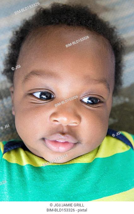 Close up of smiling face of Black baby boy