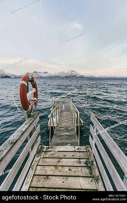 Lonely wooden jetty in Lofoten, Norway, central perspective