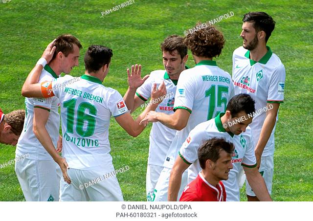 Bremen's players celebrate Fin Bartels' (M) goal at 2:0 during the friendly match between FC Zbrojovka Brunn and Werder Bremen at the Parkstadion in Zell am...