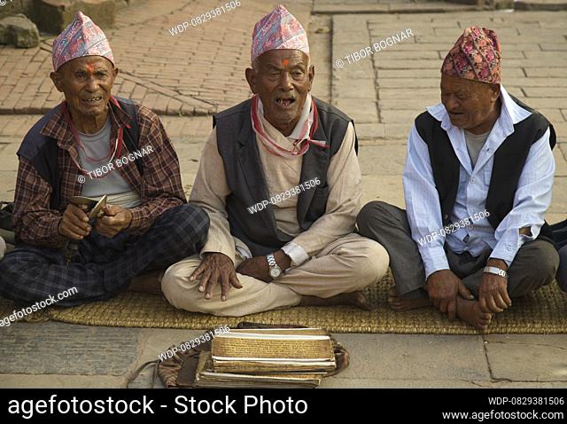 Nepal, Bhaktapur, Dashain Festival, old men, singing, traditional songs, , Credit:Tibor Bognar / Avalon