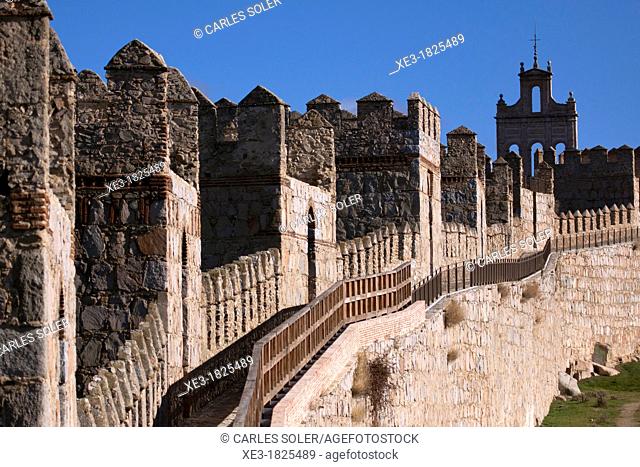 Chemin de ronde (walkway) and Espadaña del Carmen bell gable in background, City Wall, Avila, Spain