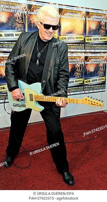 German singer Heino poses with a Fender Telecaster guitar during a photo opportunity for the Munich Summer Night's Dream in Munihc, Germany, 20 Ferbuary 2013