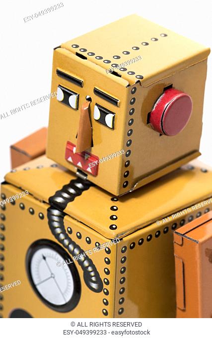 Vintage tin robot toy isolated on a white background