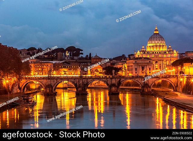 Angelo Bridge and St. Peter's Basilica at dusk, Rome, Italy