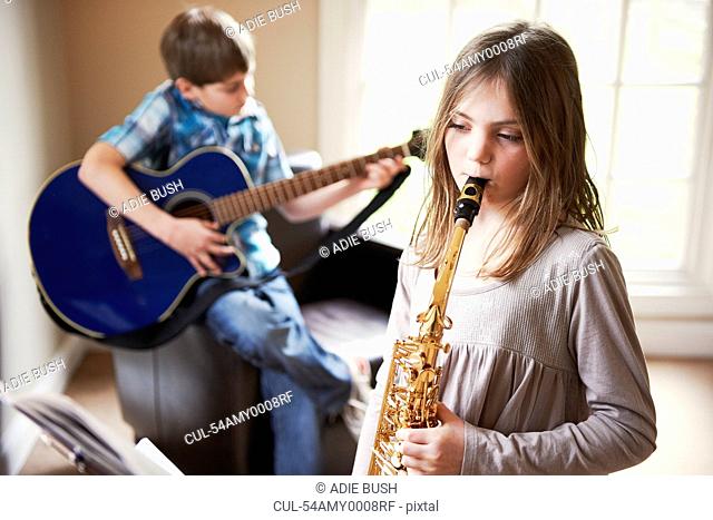 Children playing music together